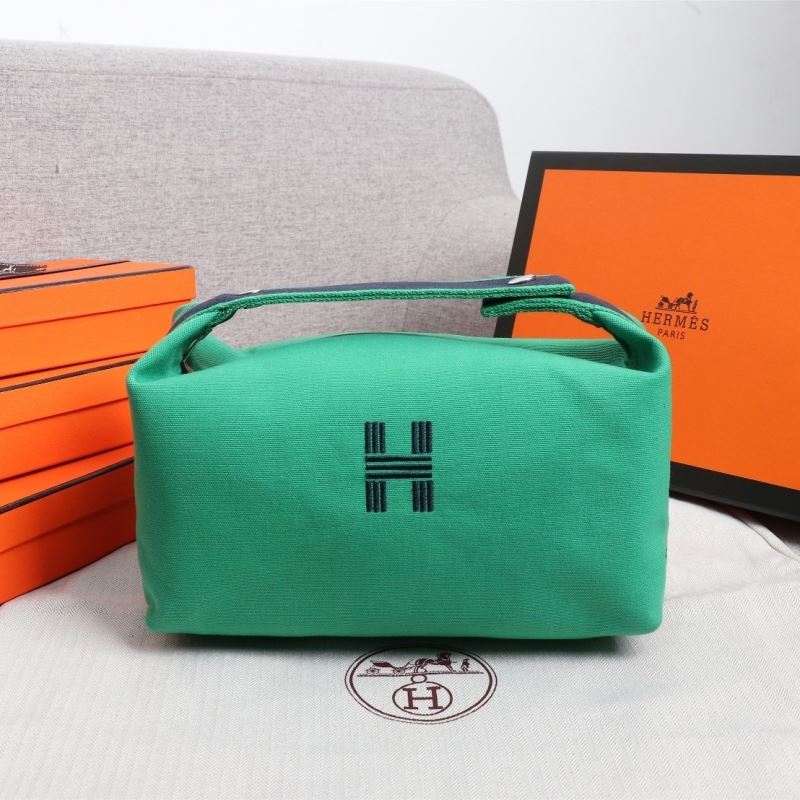 H**mes clutch bags